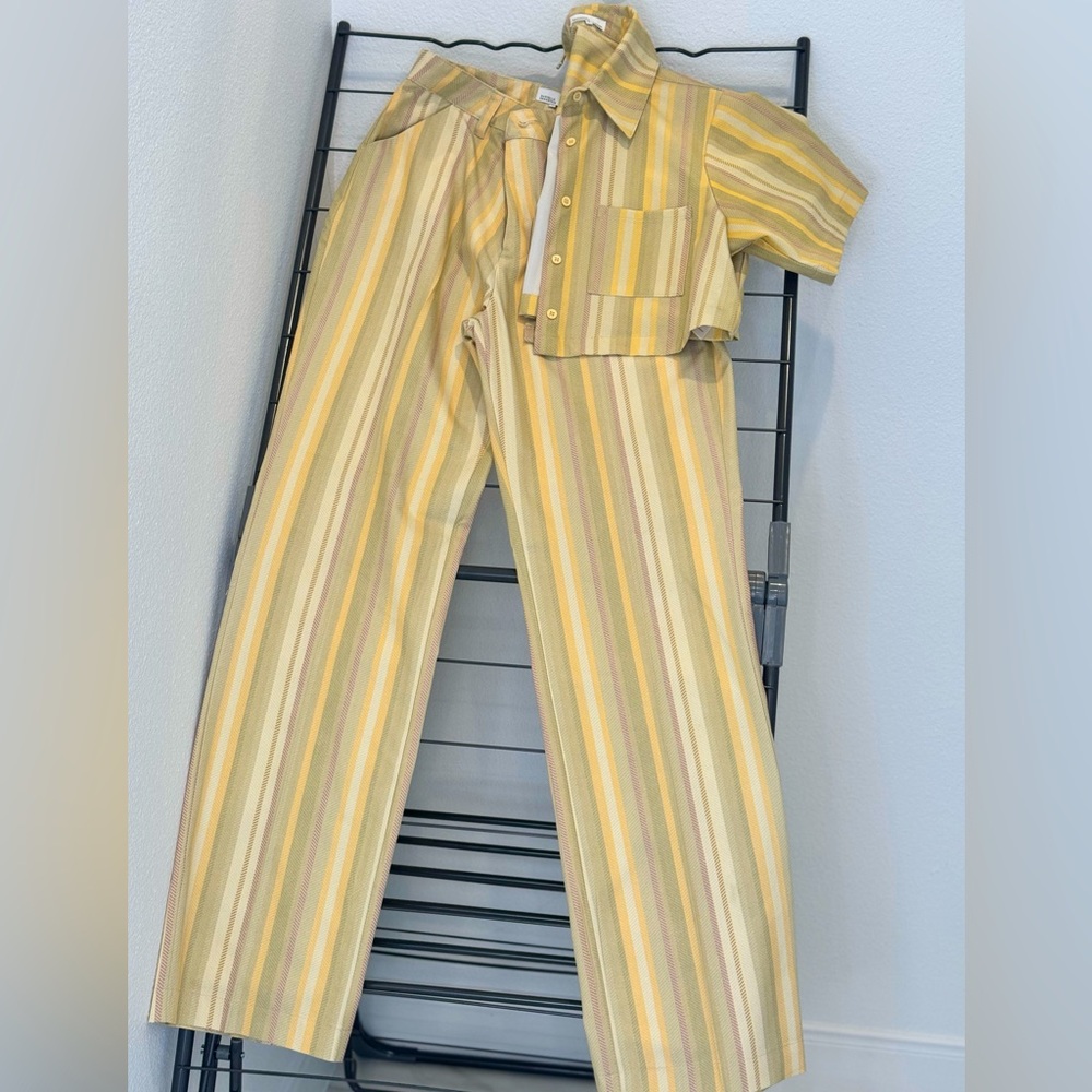 Barely worn two piece pants and crop button up shirt. Cream,light yellow lines